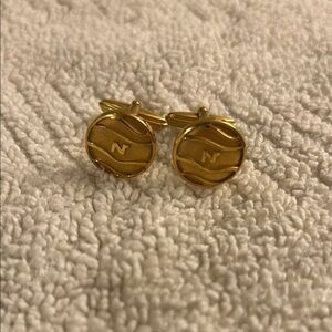 Nina Ricci Gold Circular Cuff Links with Engraved Design